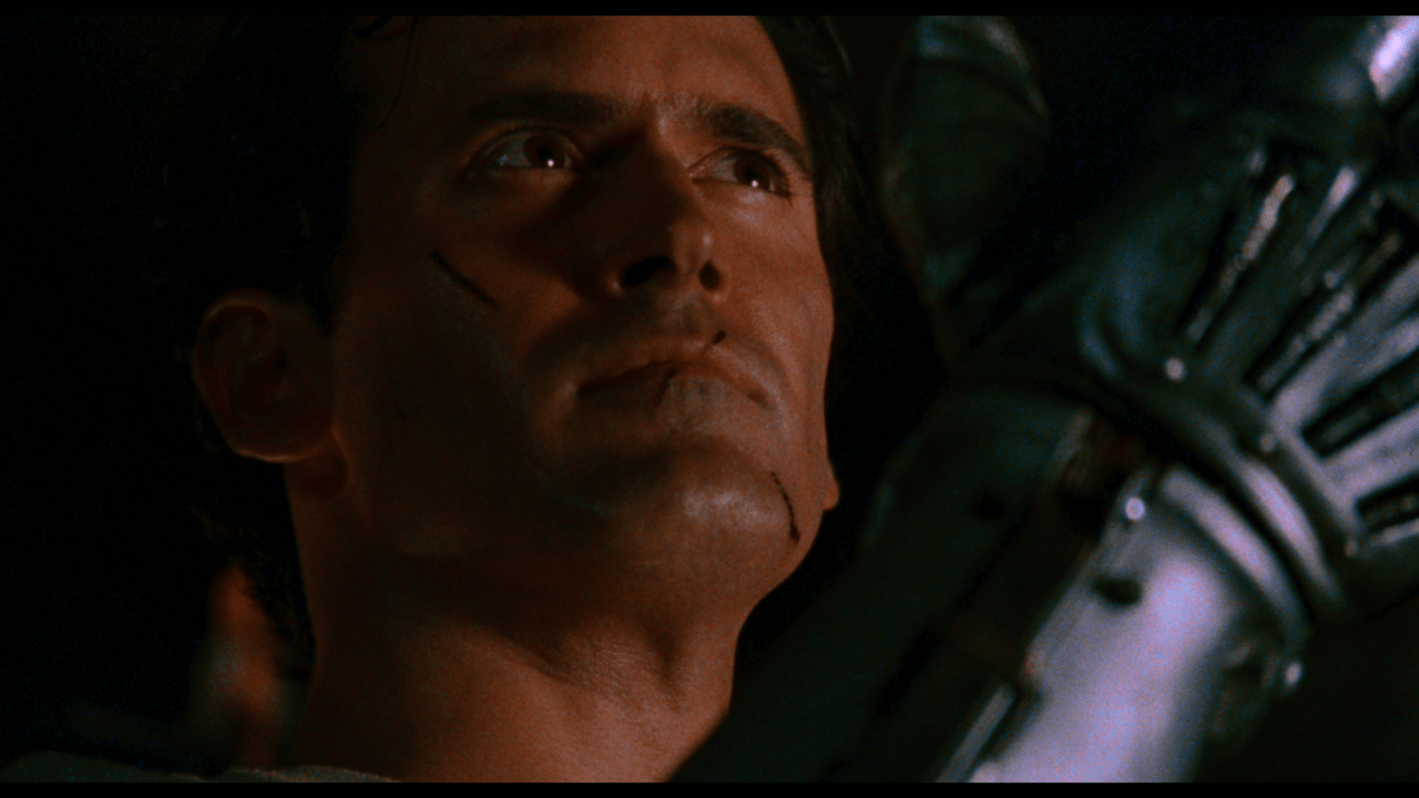 Army of Darkness - Ash equips his mechanical hand